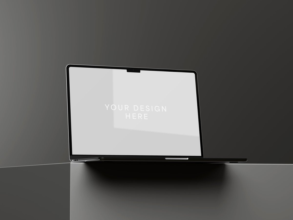 Premium dark mode MacBook mockup displaying website design